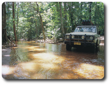 4WD Vehicle Through Creek, Queensland